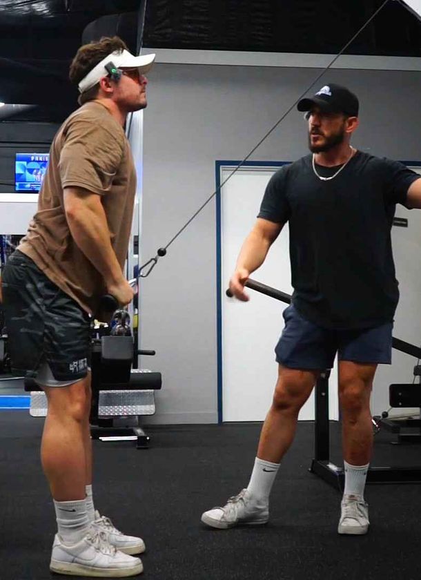 man exercising in a class